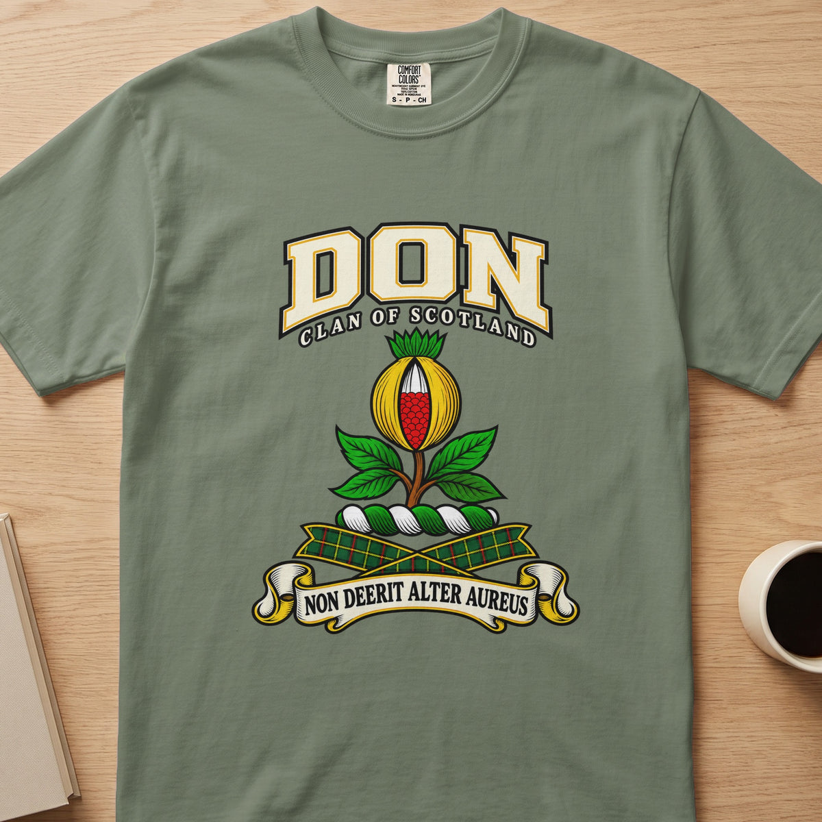 Don clan T-shirt in sage green, front view with red and gold fruit with green leaves