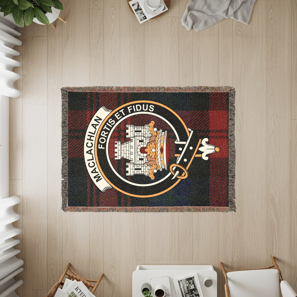 MacLachlan woven blanket displayed on a wall, featuring the crest badge and tartan background