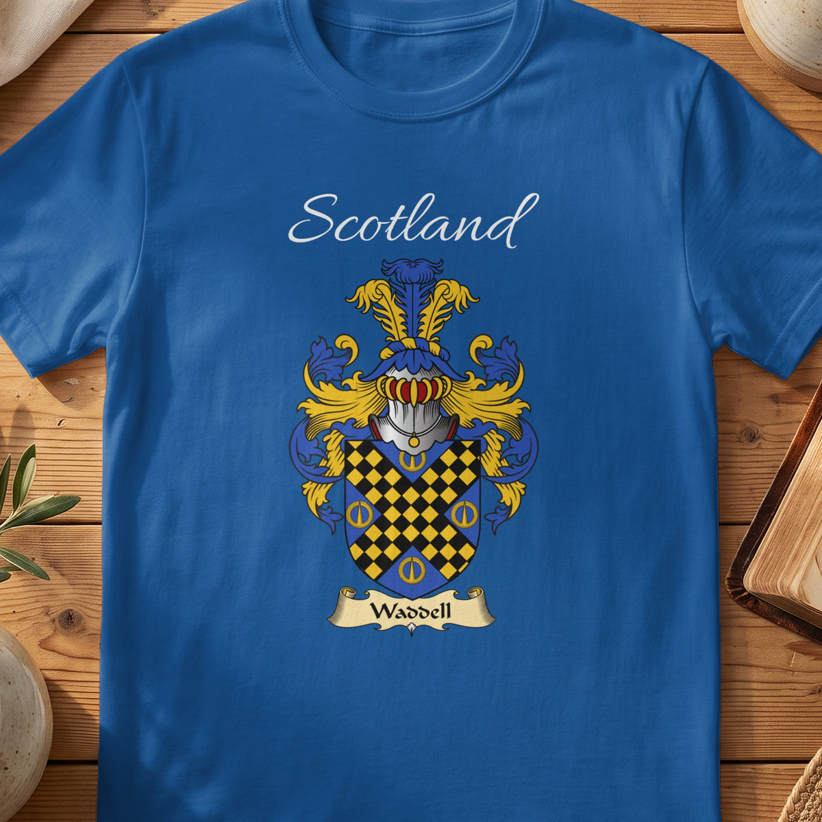 Royal blue Waddell unisex heritage T-shirt with the family shield and surname design.