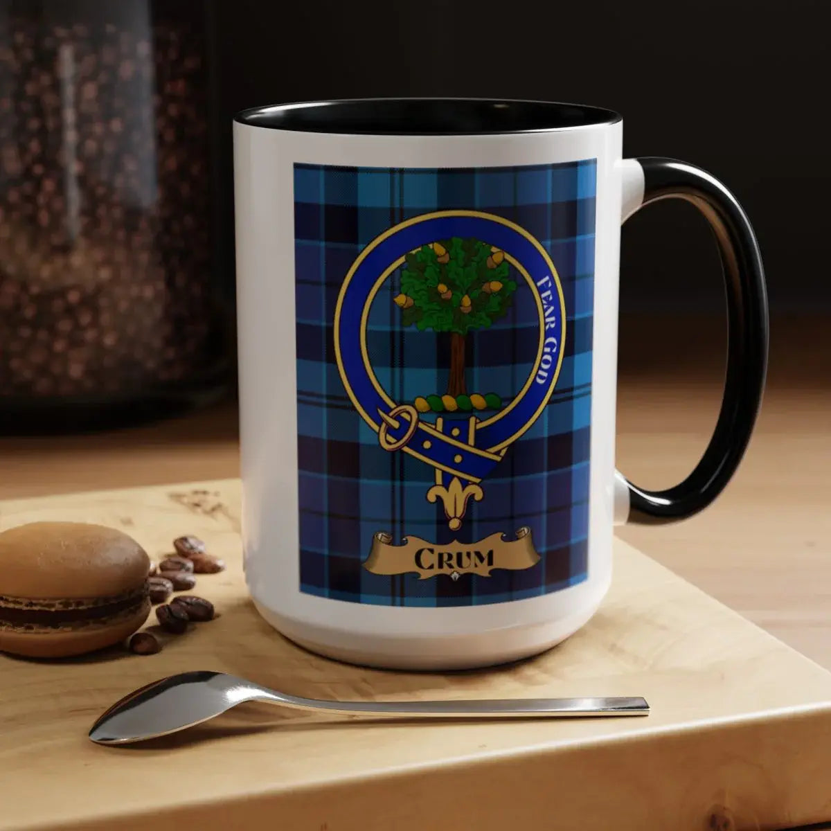 Close-up of the Crum clan crest printed on a ceramic mug