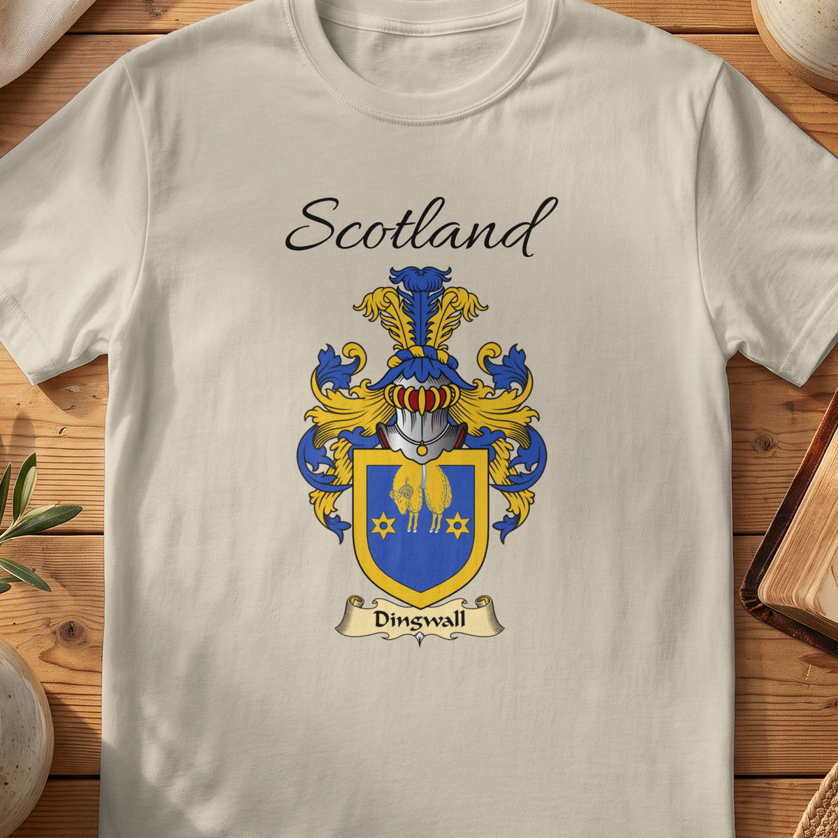 Sand Dingwall Scottish family shield T-shirt featuring a gold border and gold motifs on blue