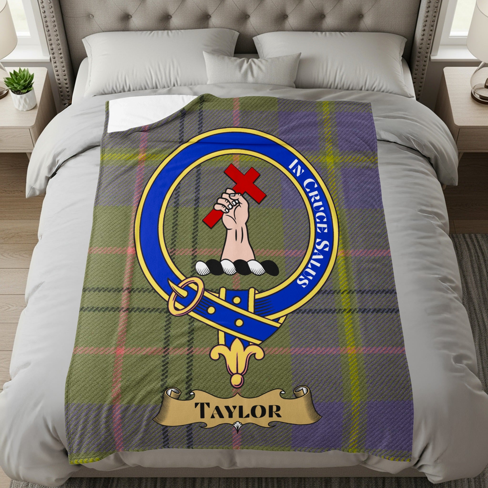 Taylor clan crest with motto on tartan throw blanket