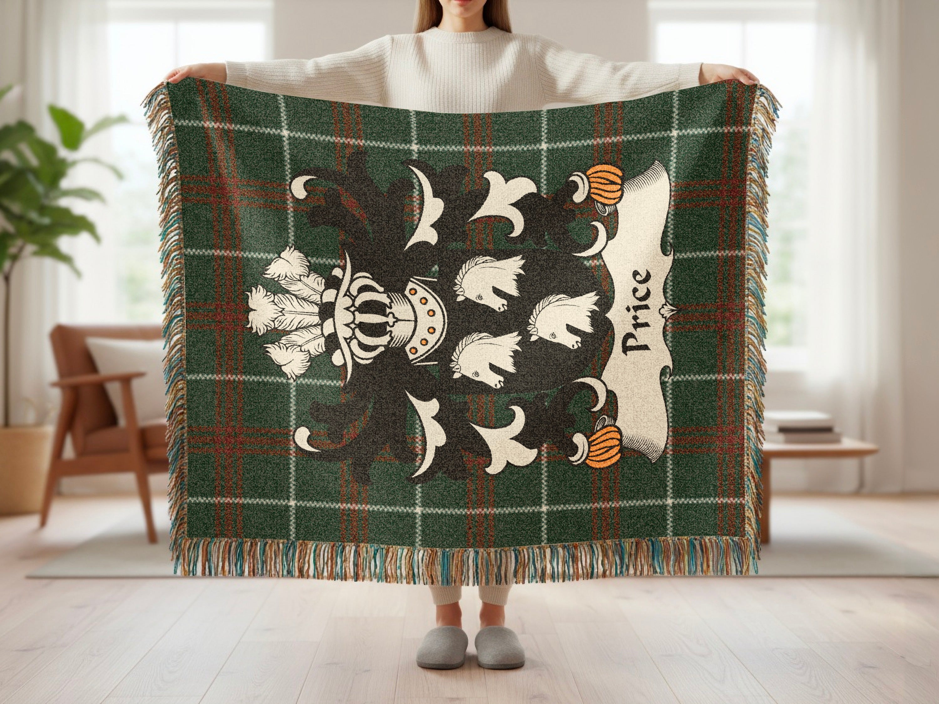 Green tartan plaid blanket with a coat of arms and the name "Price".