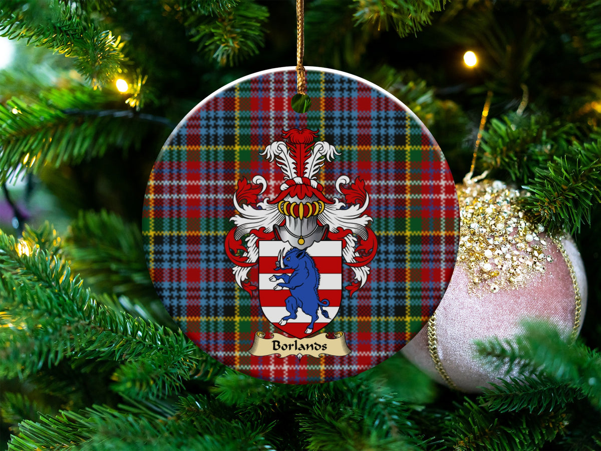 Borlands Scottish clan ceramic ornament with family crest on a Caledonia tartan background, hanging on a Christmas tree