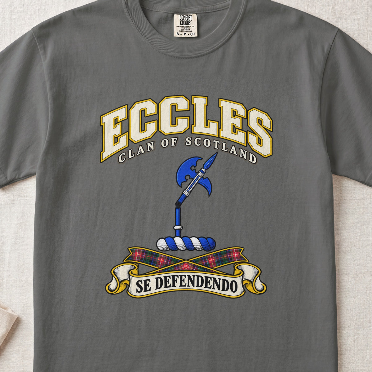 Eccles Scottish clan T-shirt in Pepper, front view with a blue halberd and motto design.