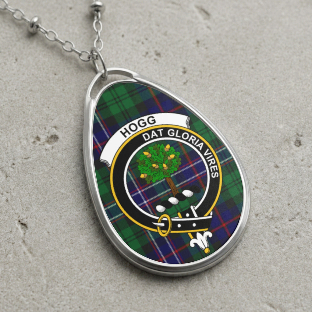 Oval pendant necklace with Hogg clan tartan and crest.