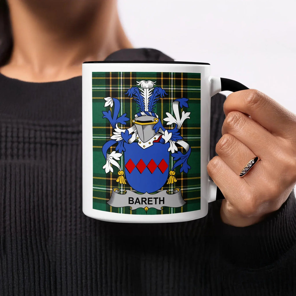 White mug with Bareth family crest on a plaid background.