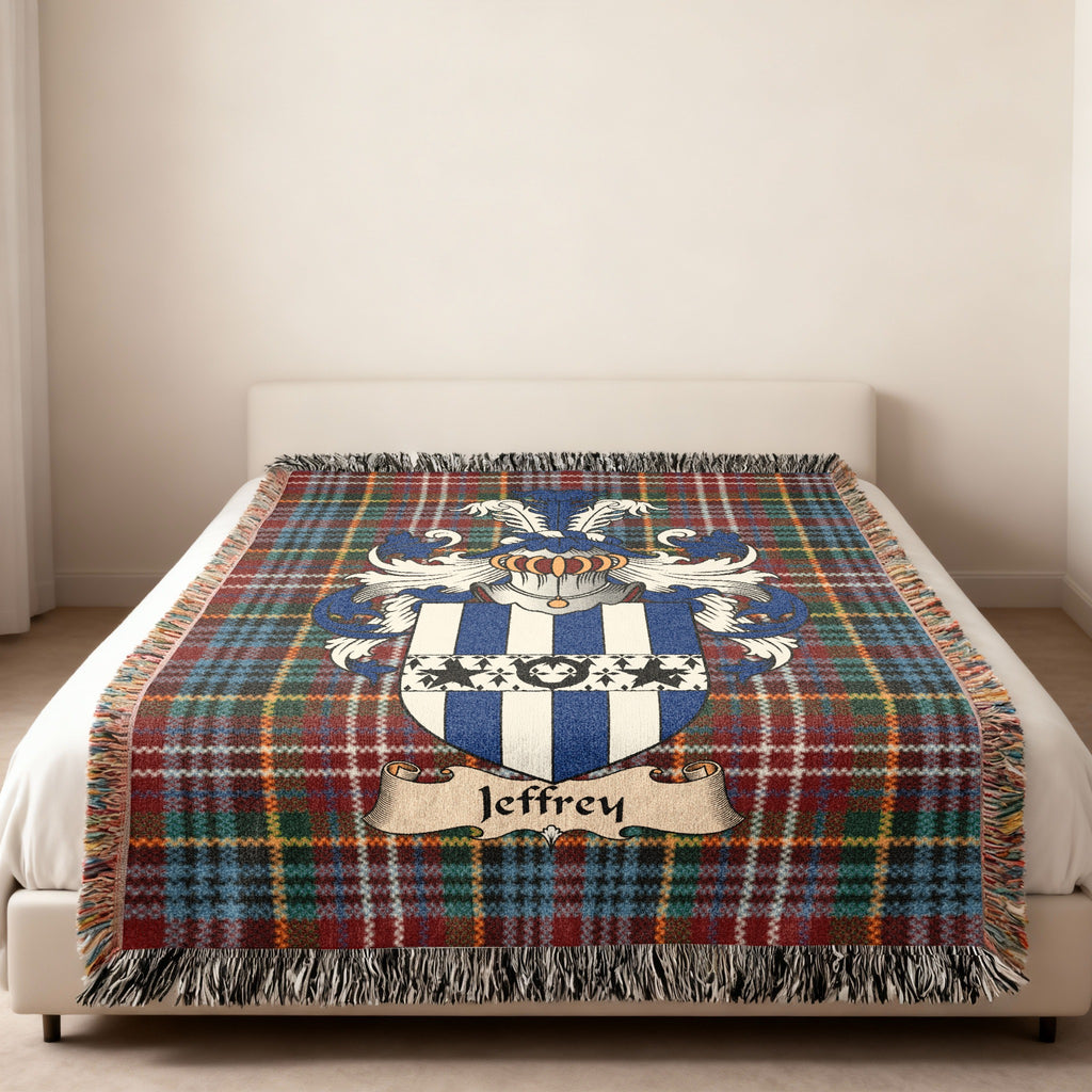 Jeffrey Scottish family shield woven blanket on a Caledonia tartan background