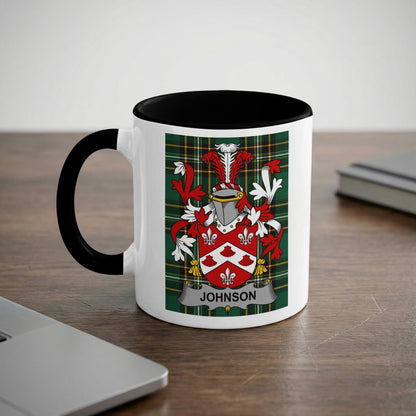 White mug with black rim featuring the Johnson family crest.