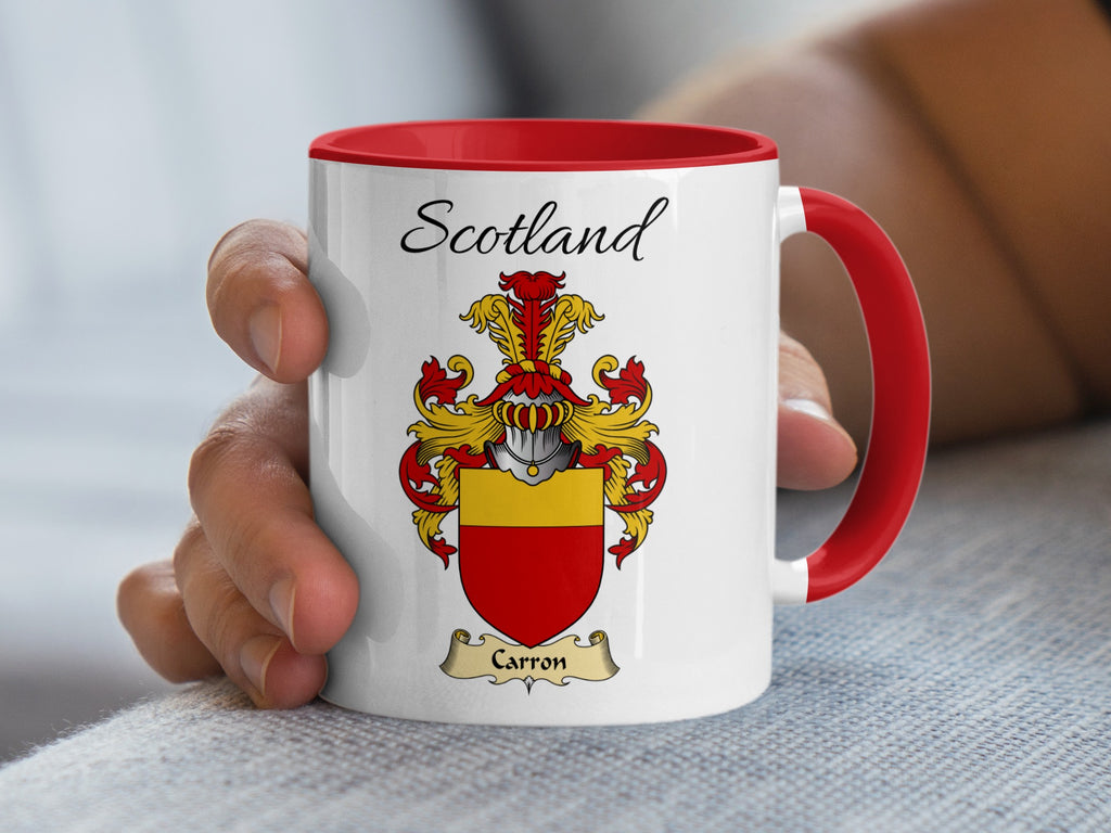 Red-accent Carron Scottish surname mug with matching handle and interior and coat of arms artwork beneath “Scotland”.