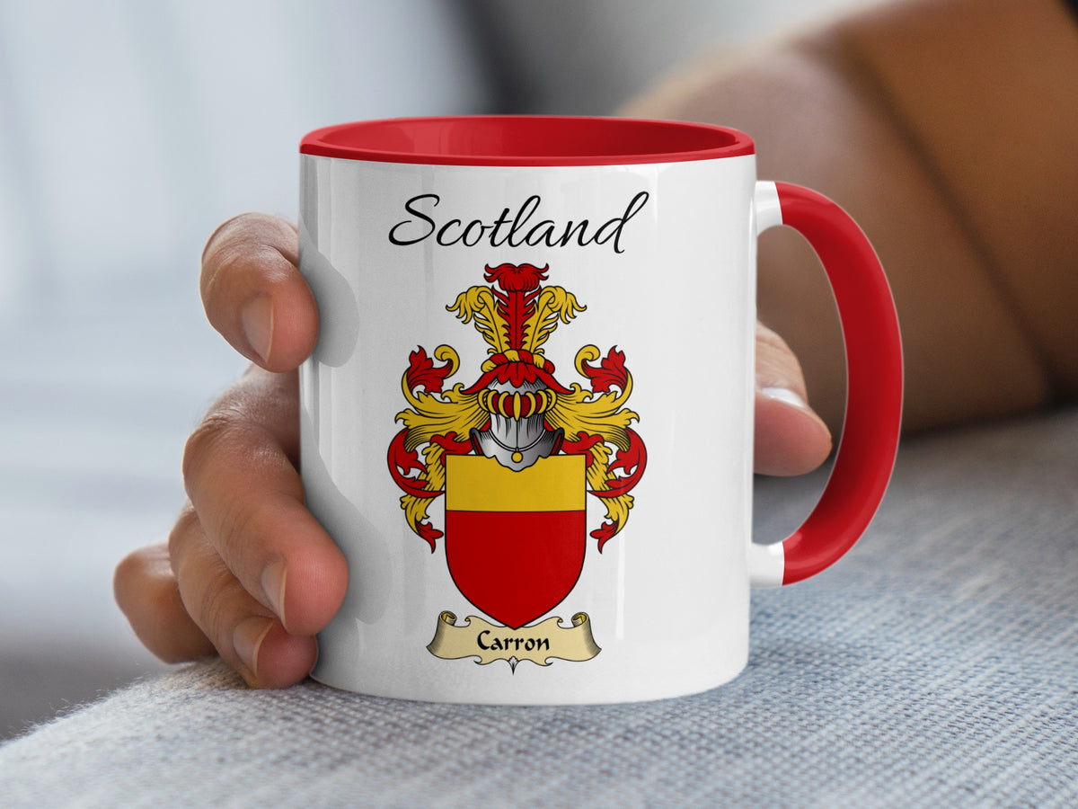 Red-accent Carron Scottish surname mug with matching handle and interior and coat of arms artwork beneath “Scotland”.