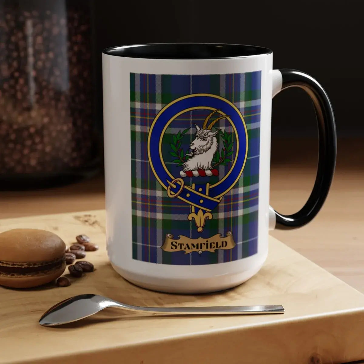 Close-up of the Stamfield clan crest printed on a ceramic mug