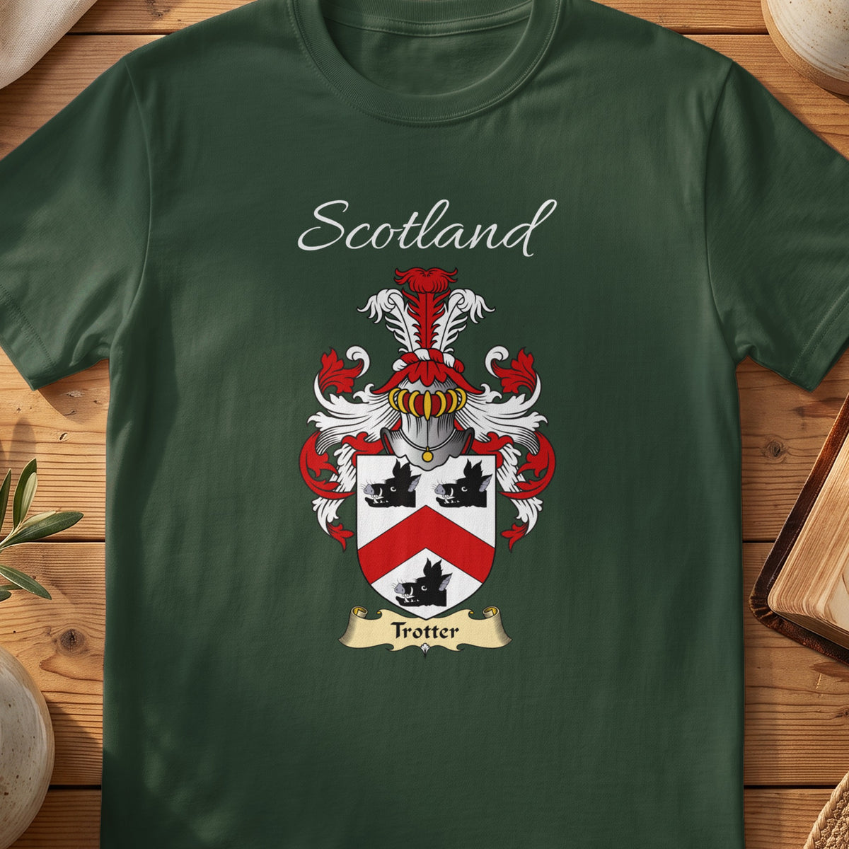 Forest Green Trotter Scottish T-shirt laid flat with coat of arms artwork and “Scotland” text.