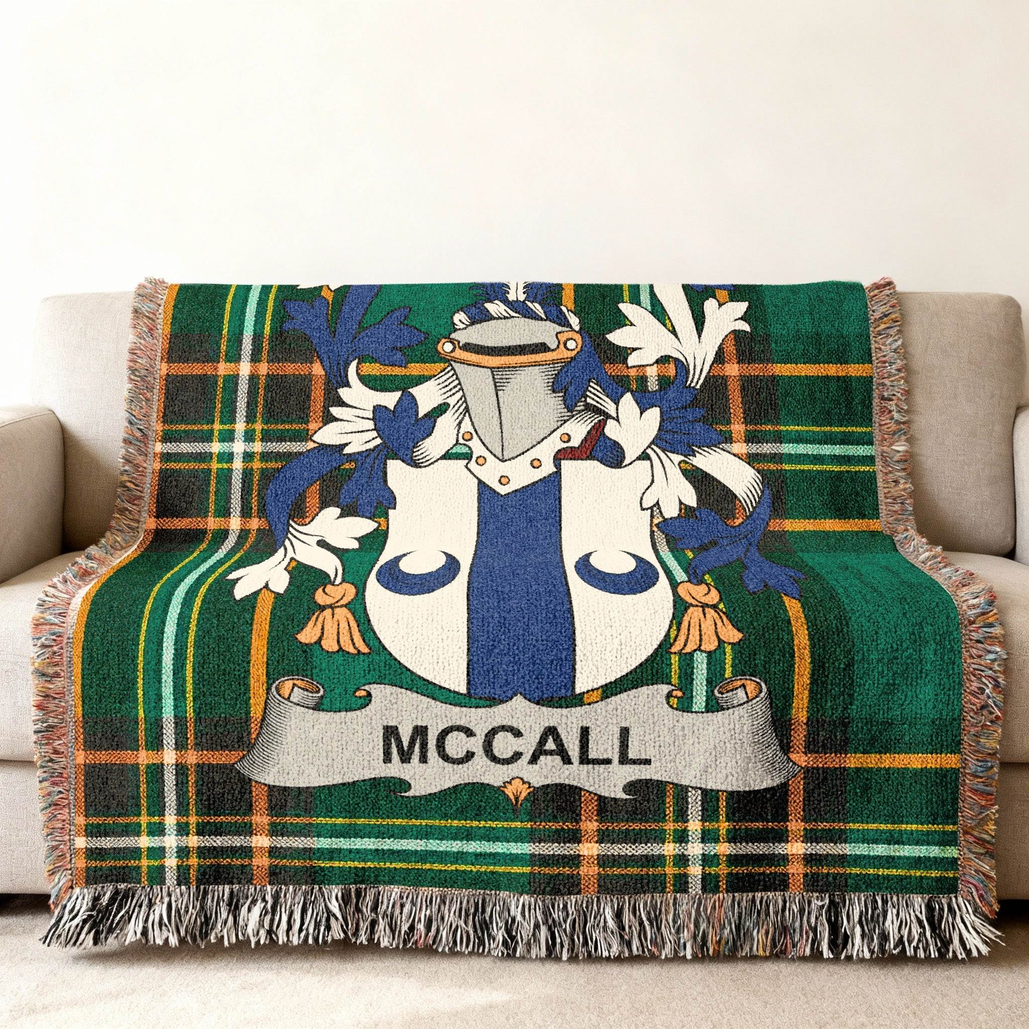 Green plaid blanket featuring the McCall family crest and name.