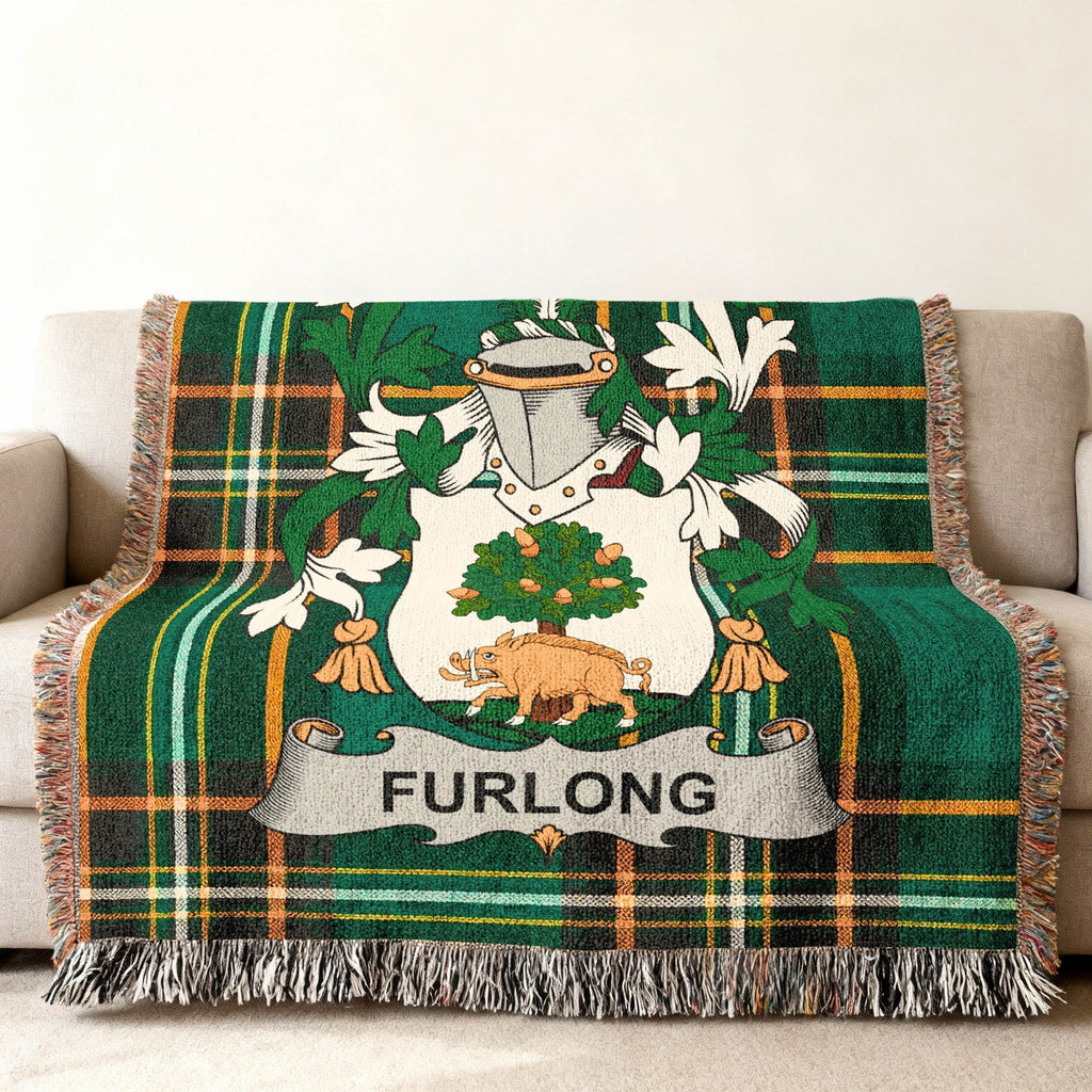 Furlong crest blanket in green tartan with fringe.