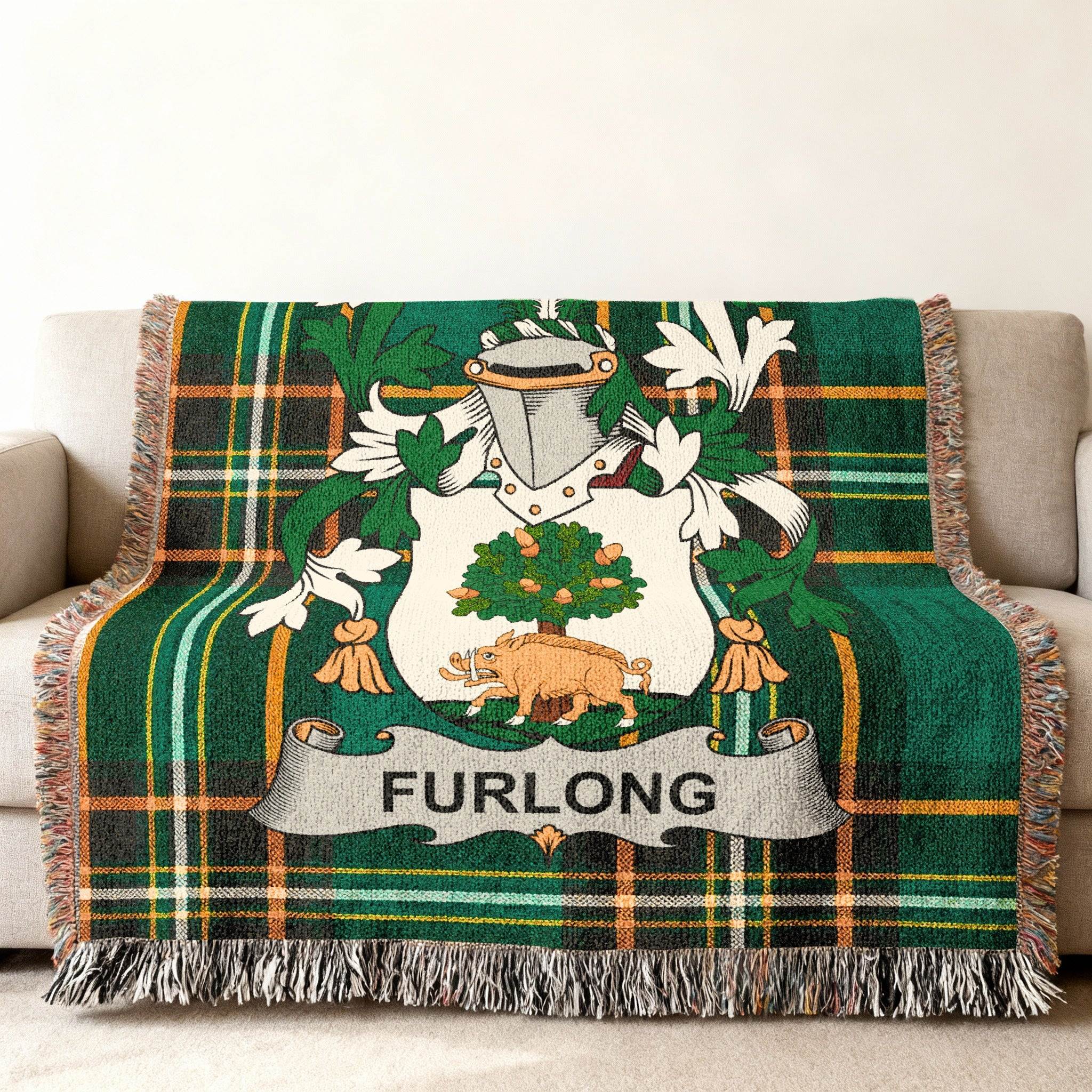 Furlong crest blanket in green tartan with fringe.