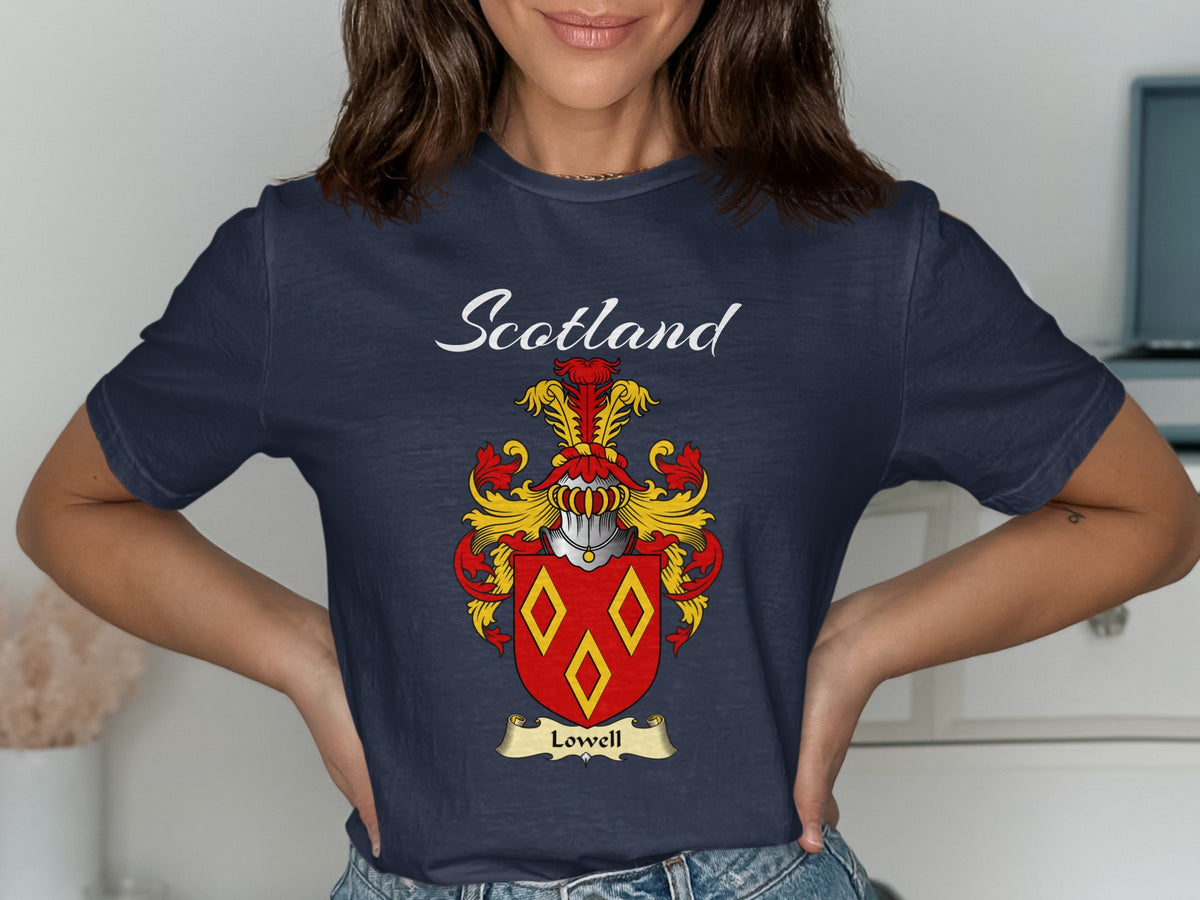 Model wearing a navy Lowell T-shirt featuring three gold diamond outlines on red