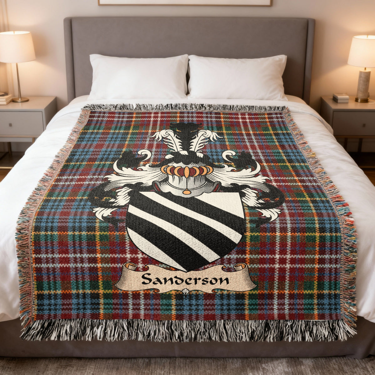 Sanderson family crest emblem on a Caledonia tartan woven blanket