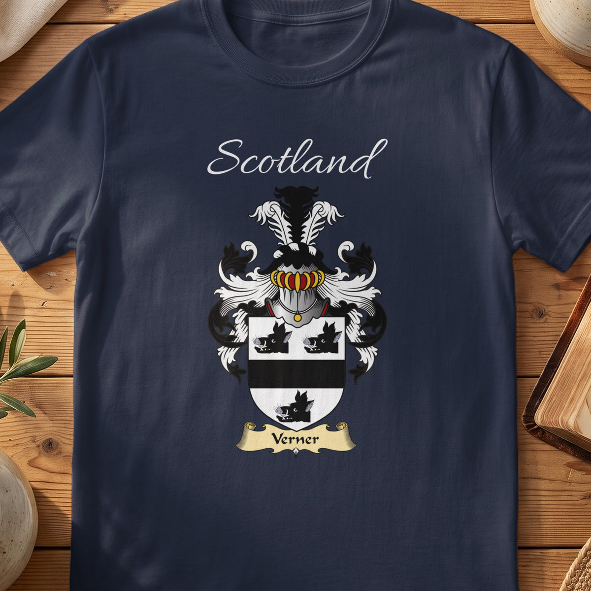 Navy Verner heritage T-shirt laid flat with “Scotland” and the colourful family shield design.