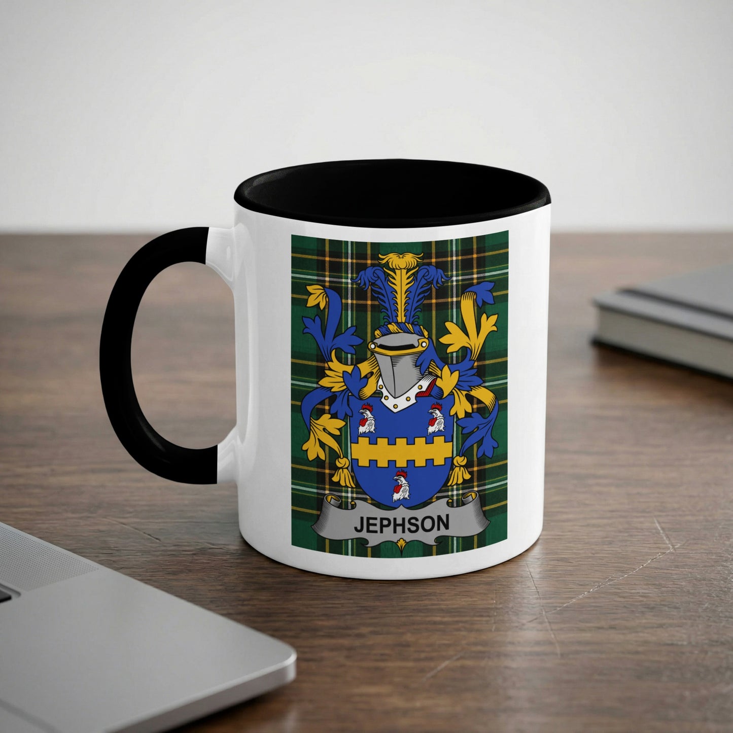 White mug with black handle featuring the Jephson family crest.