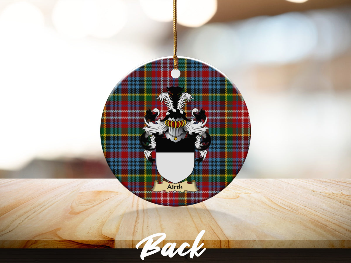 Round Airth Scottish clan ornament with family crest on a Caledonia tartan background