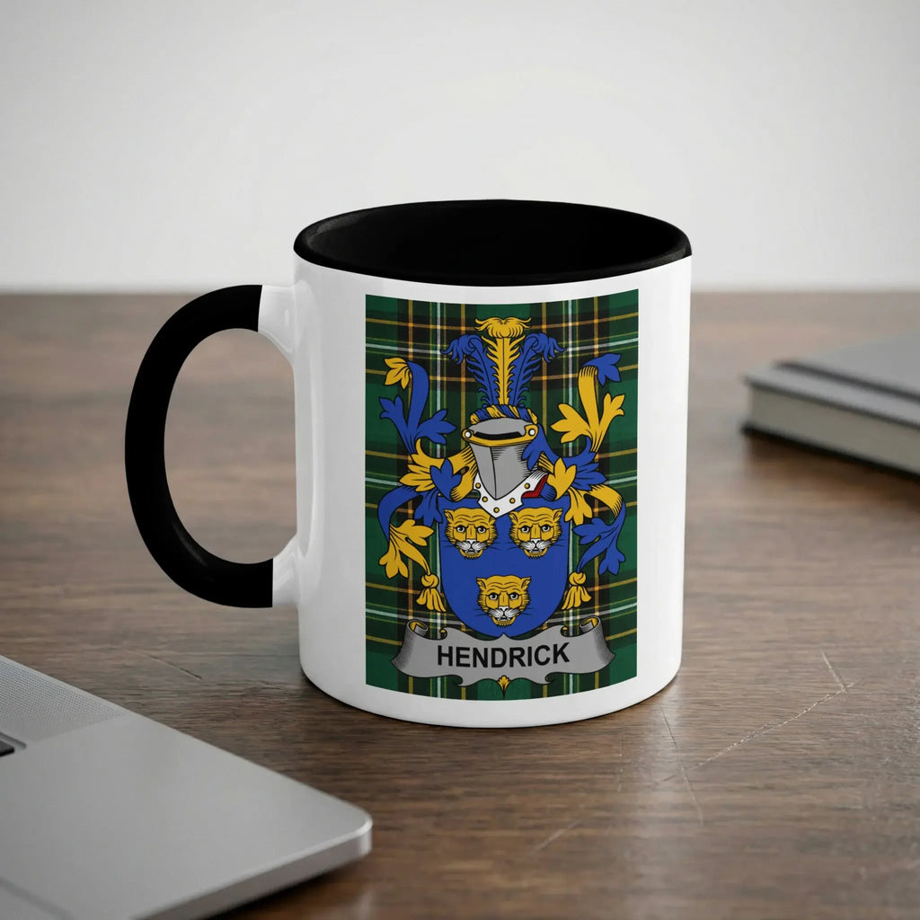 Mug with the Hendrick family crest on a wooden desk.