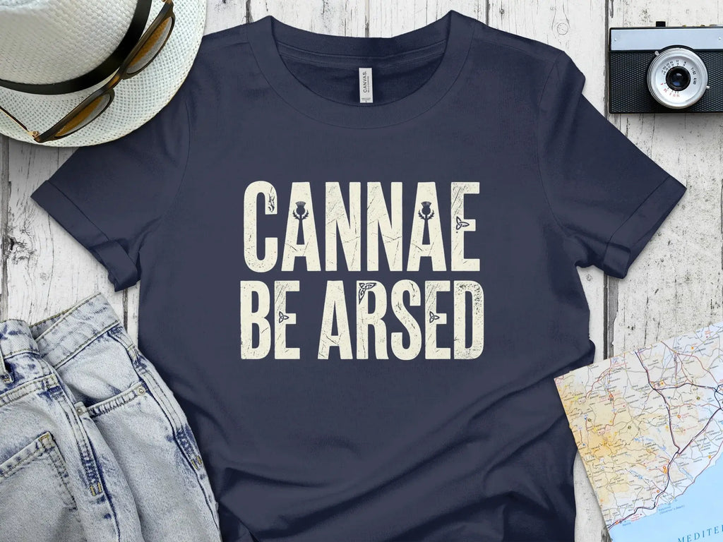 Navy t-shirt with "CANNAE BE ARSED" text and Scottish thistle graphic.
