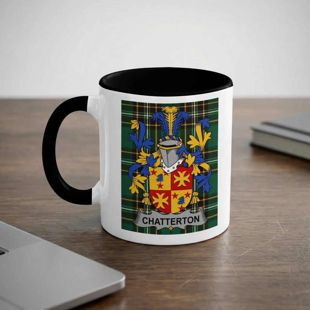 Mug with the Chatterton family crest on a wooden desk.