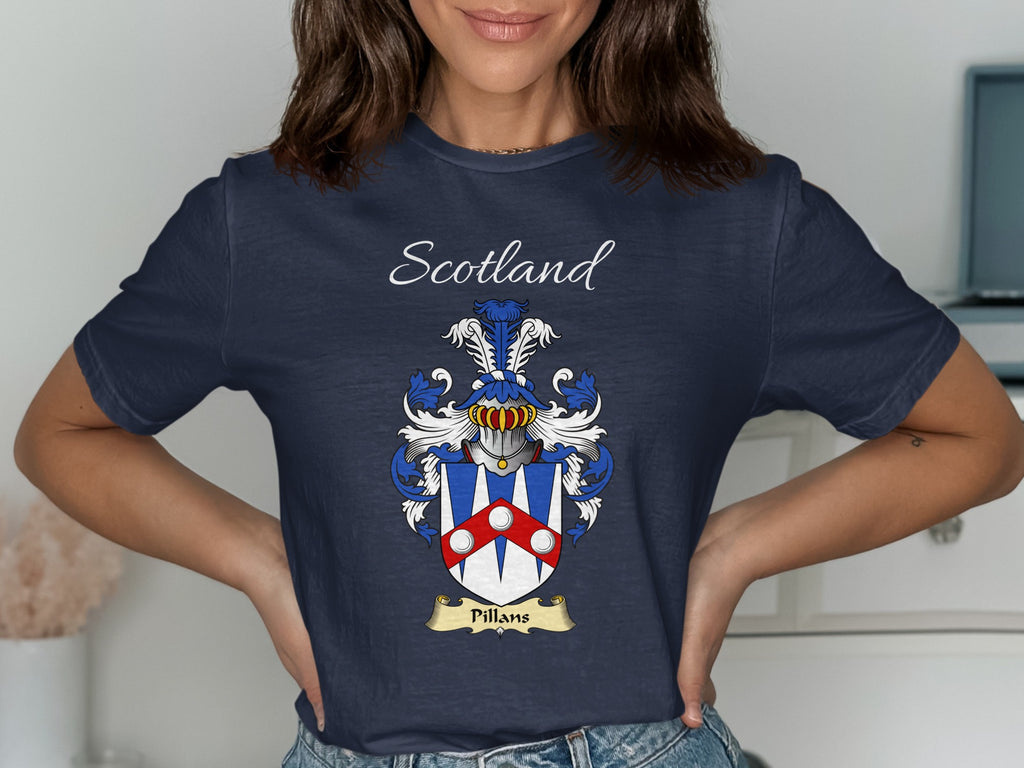 Model wearing the navy Pillans family crest T-shirt featuring “Scotland” and the surname banner.