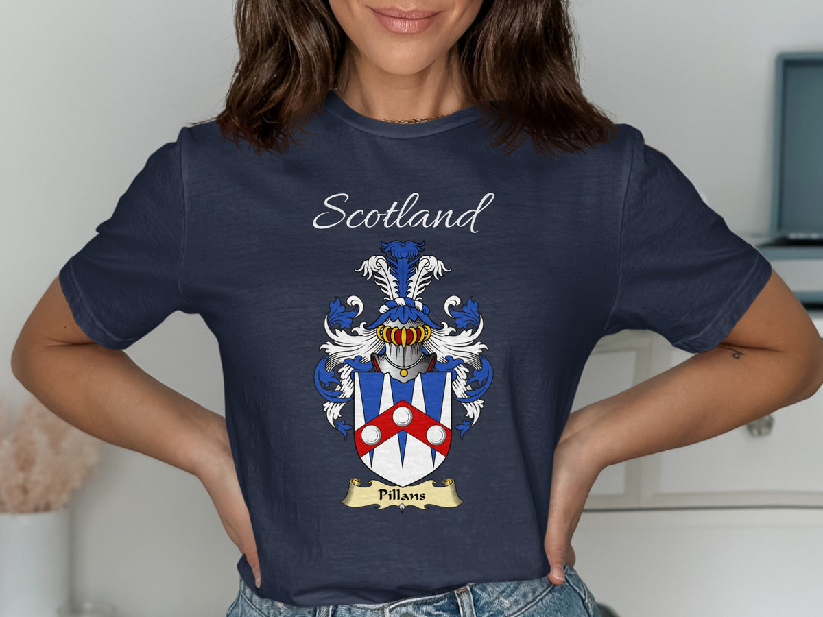 Model wearing the navy Pillans family crest T-shirt featuring “Scotland” and the surname banner.