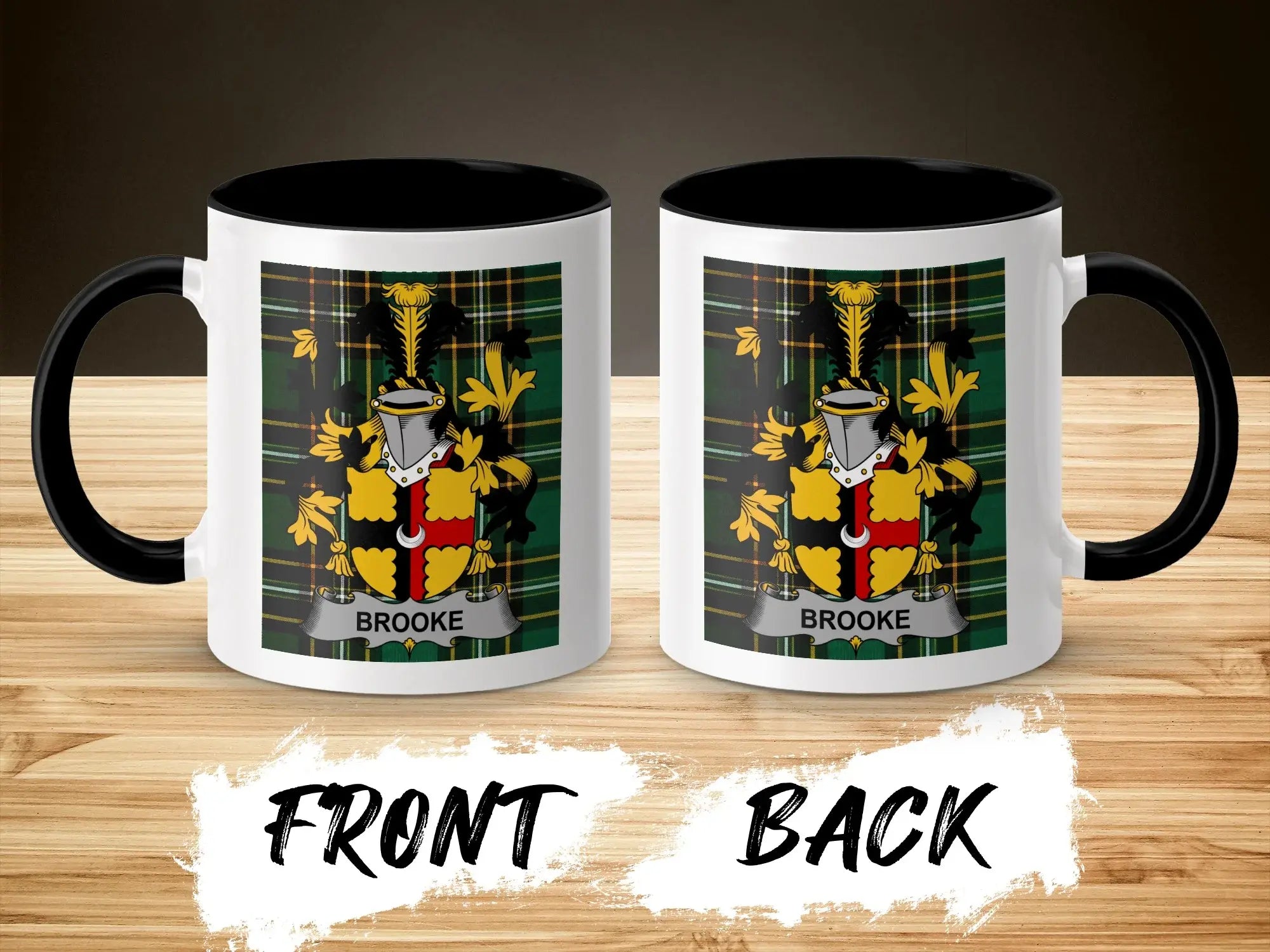 Two mugs featuring the Brooke family crest and tartan on a wooden surface.