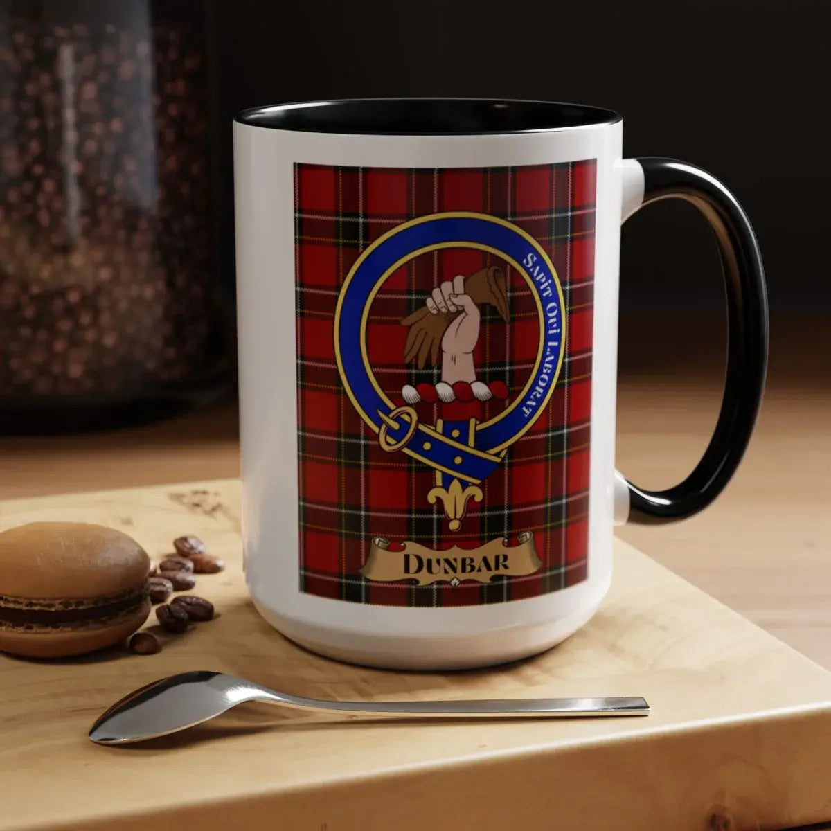 Close-up of the Dunbar clan crest printed on a ceramic mug