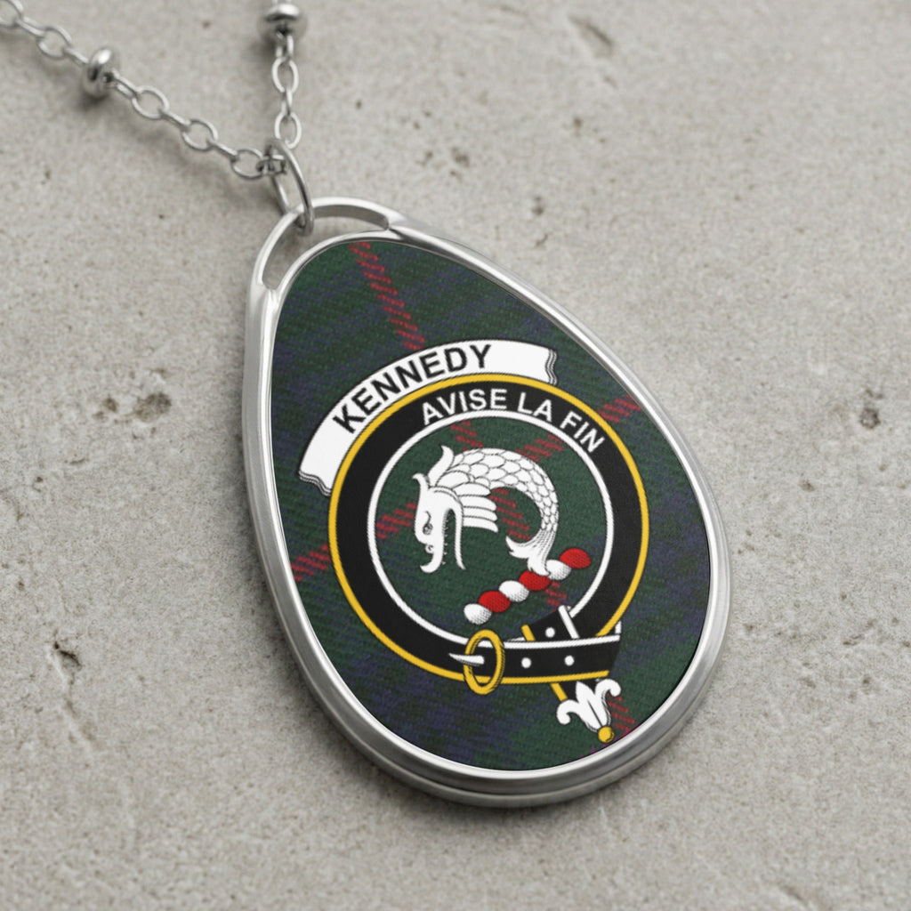Kennedy clan Scottish tartan necklace with clan crest and Avise La Fin motto on tartan background