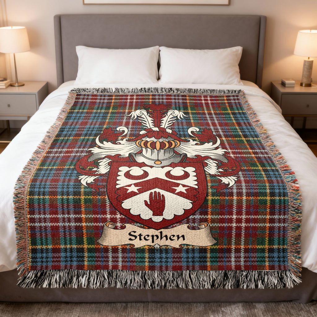 Stephen family crest emblem on a Caledonia tartan woven blanket