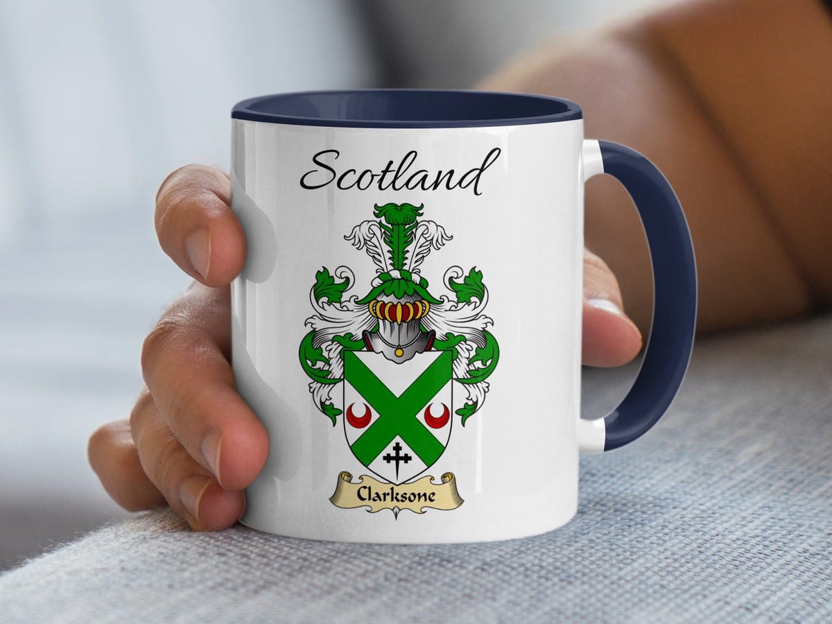 White Clarkesone heritage mug with navy handle and interior, displaying “Scotland” and the colourful family emblem.