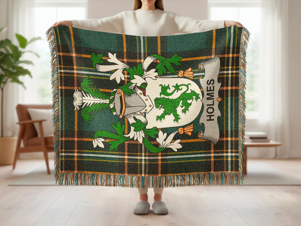 Holmes tartan blanket with coat of arms featuring a green lion rampant.