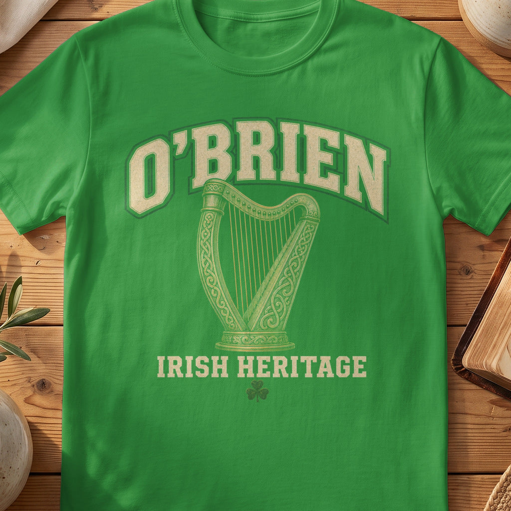 O'Brien Irish harp T-shirt in Irish Green, with cream surname lettering, a gold-toned harp, green shamrock and “Irish Heritage” text.