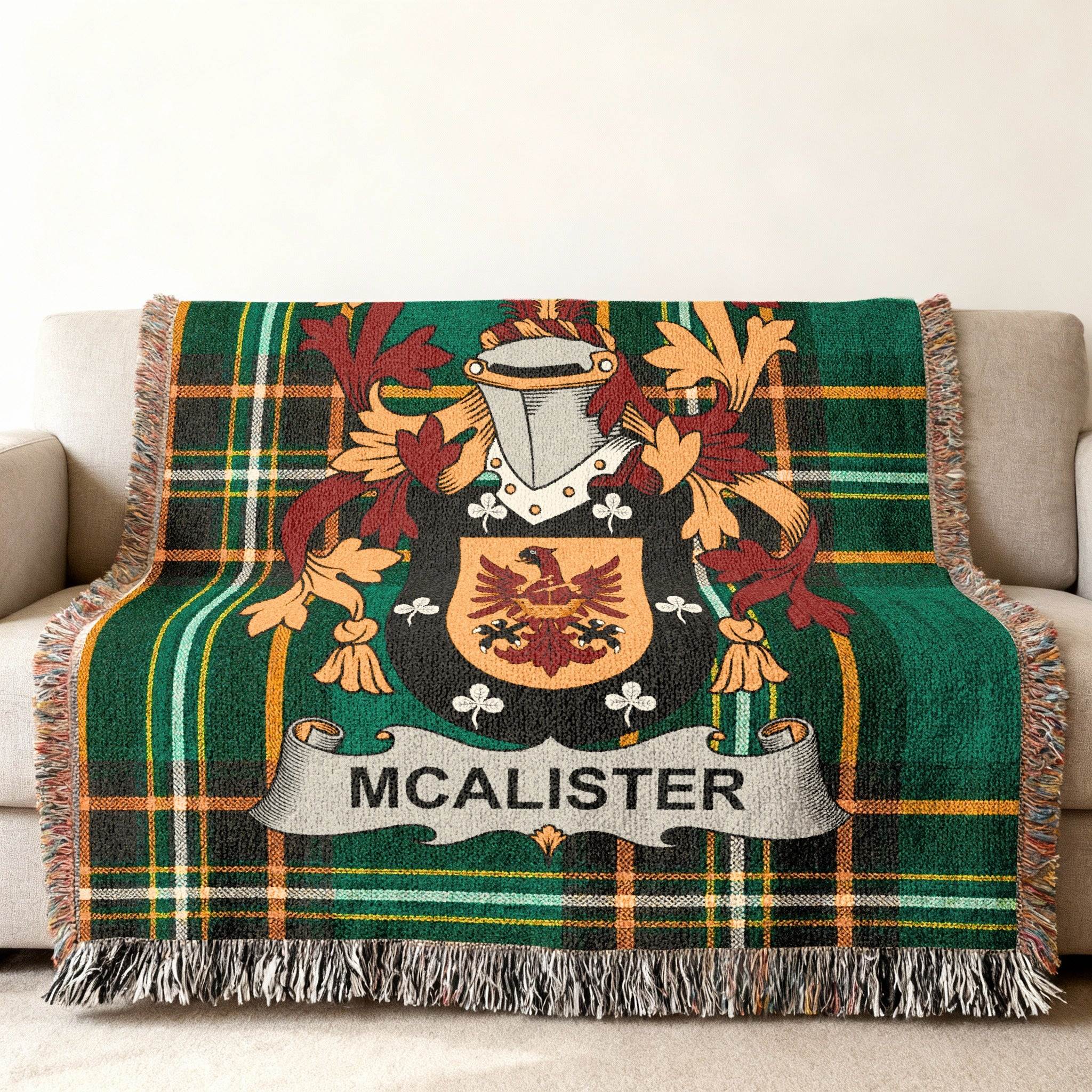 McAlister family emblem woven into a green Irish National Tartan blanket