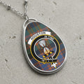 Houston clan Scottish tartan necklace with clan crest and In Time motto on tartan background