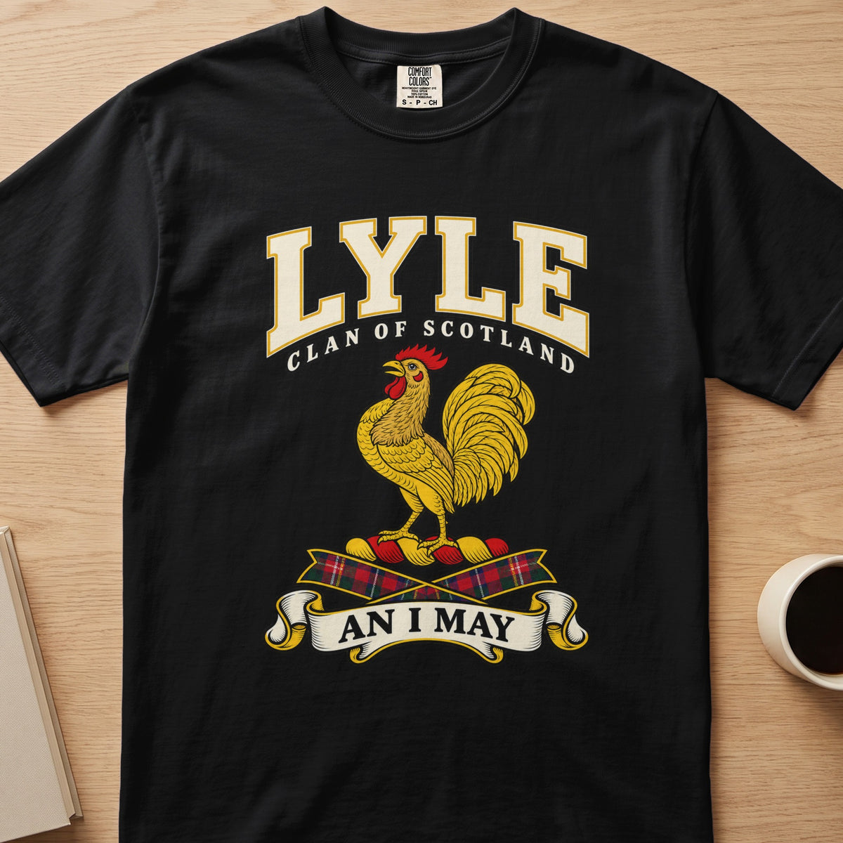 Lyle clan crest with gold rooster on a black Comfort Colors T-shirt, front view