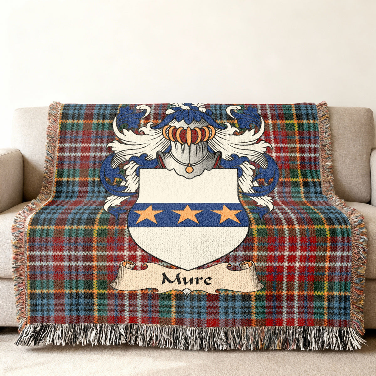 Mure Scottish family shield woven blanket on a Caledonia tartan background