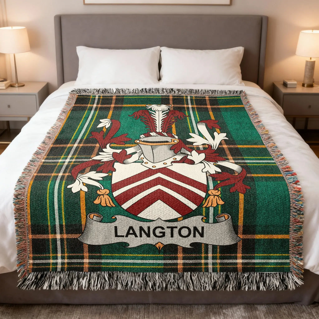 Green plaid blanket with Langton family crest displayed on a bed.
