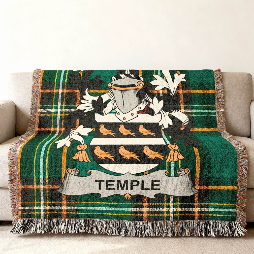 Tartan blanket with a coat of arms featuring birds and "TEMPLE" text.