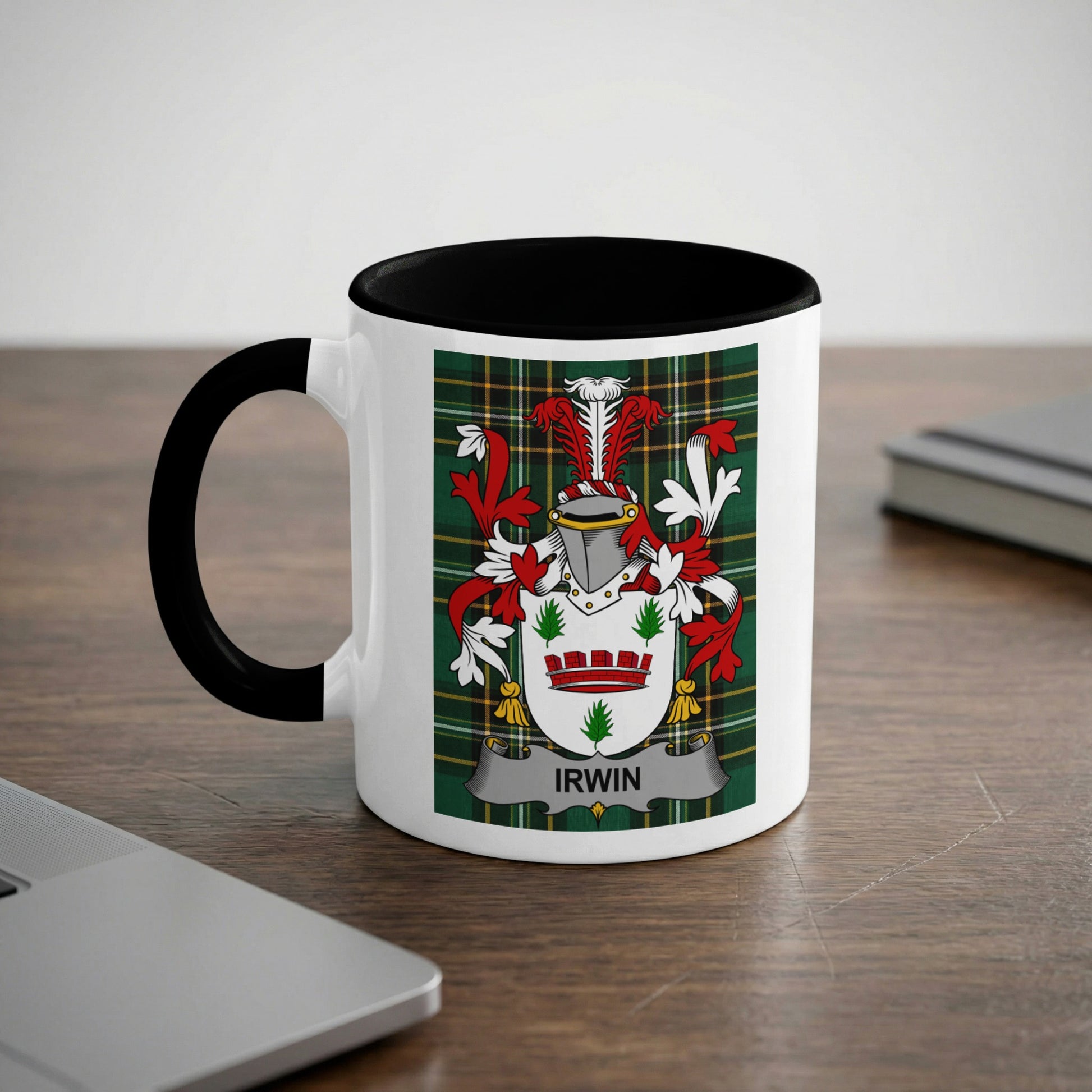 White mug with black rim featuring a green tartan pattern and the Irwin family crest.