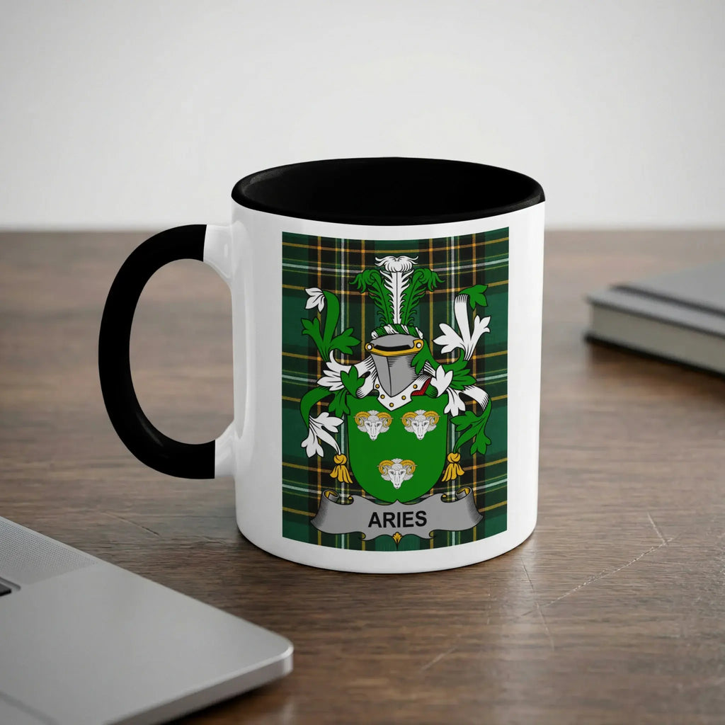 Mug with Aries crest on a green plaid background.