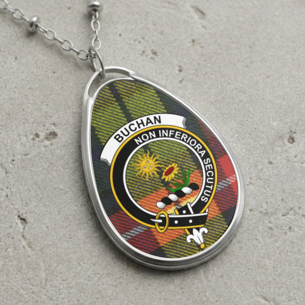 Buchan clan Scottish tartan necklace with clan crest and Non Inferiora Secutus motto on tartan background