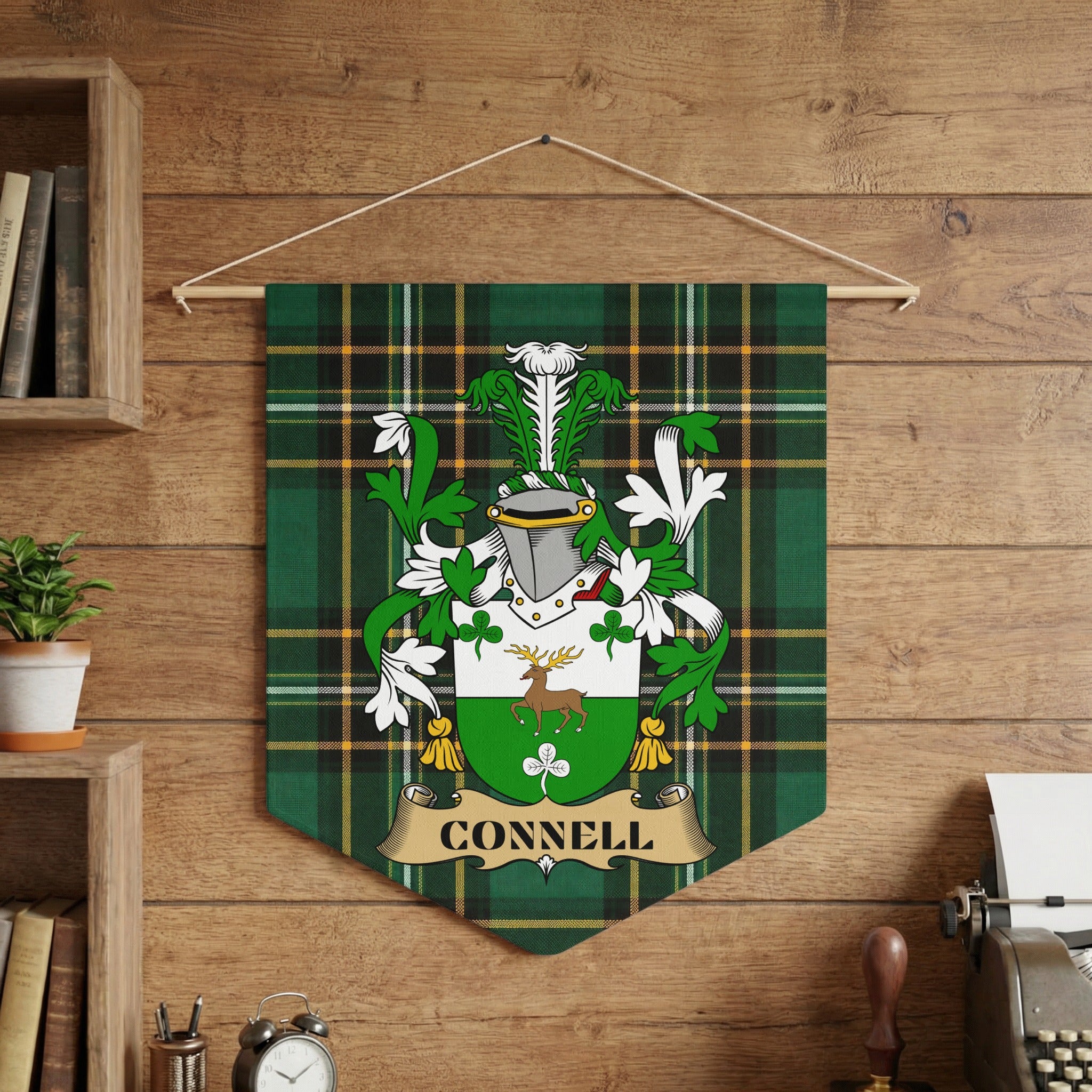 Connell family crest on green plaid banner hanging on a wooden wall.