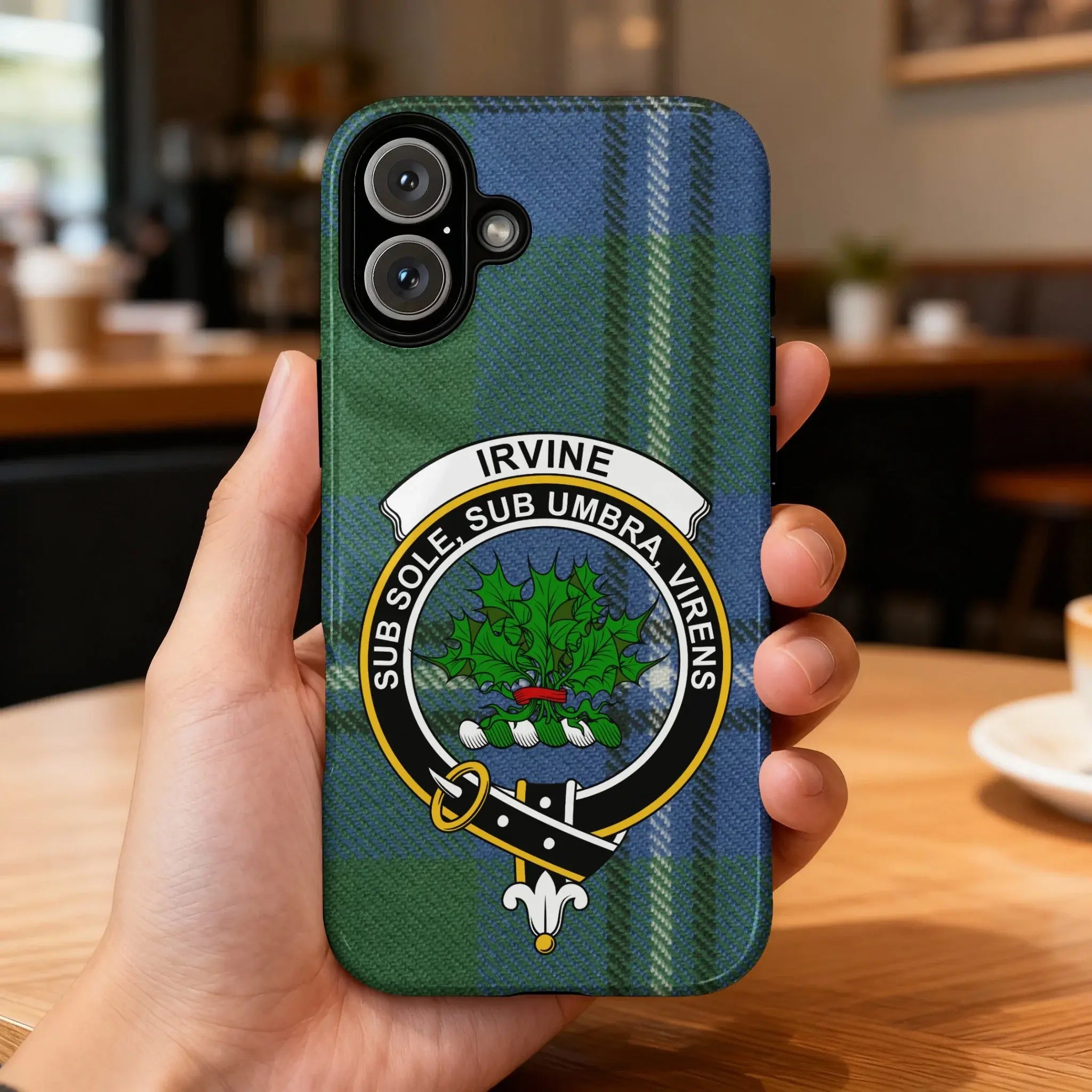 Clan Irvine crest phone case — iPhone fit shown, edge-to-edge tartan print with precise port cutouts