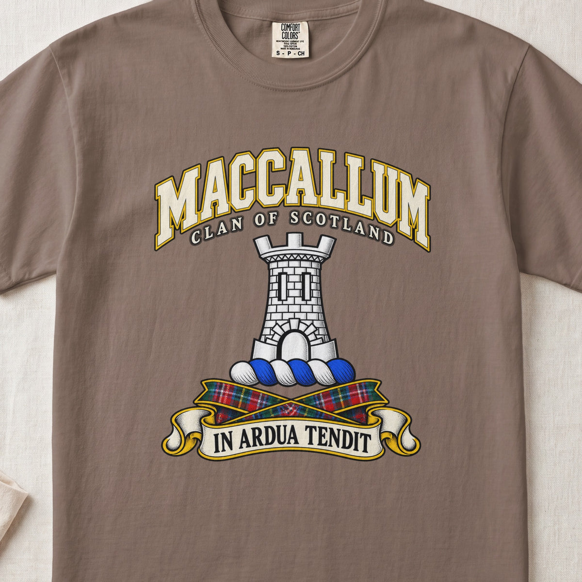 MacCallum Scottish clan T-shirt in Espresso, front view with a silver stone tower and motto design.