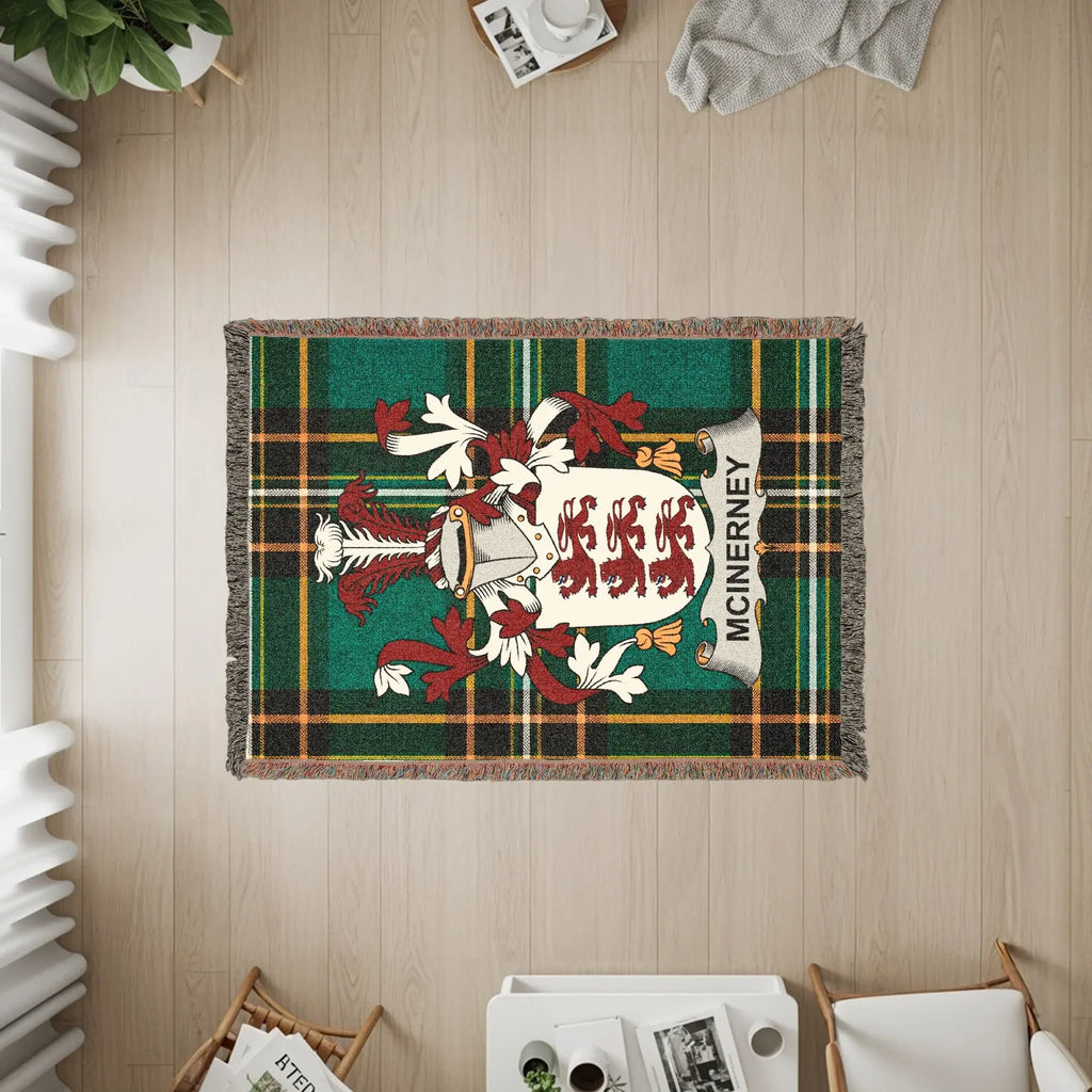 McInerney family crest on a green plaid woven blanket.